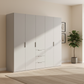 Rauch Heaven 250cm 5 Door Combi Wardrobe with Décor Doors in Silk Grey styled in a modern bedroom