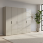 Rauch Heaven 250cm 5 Door Combi Wardrobe with Glass Doors in Fango styled in a modern bedroom
