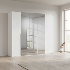 Rauch Heaven 250cm 5 Door Hinged Wardrobe with 2 Décor Doors and 3 Mirror Doors in Alpine White styled in a modern bedroom