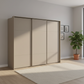 Rauch Heaven 270cm 3 Door Slider Wardrobe with Décor Doors in Fango styled in a modern bedroom