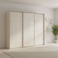 Rauch Heaven 270cm 3 Door Slider Wardrobe with Glass Doors & Lights in Champagne styled in a modern bedroom