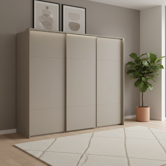 Rauch Heaven 270cm 3 Door Slider Wardrobe with Décor Doors and Lightsin Fango styled in a modern bedroom