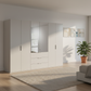 Rauch Heaven 300cm 6 Door Combi Décor Wardrobe with 4 Décor Doors and 2 Mirror Doors in Silk Grey styled in a modern bedroom