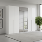 Rauch Heaven 300cm 6 Door Hinged Wardrobe with 4 Glass Doors and 2 Mirror Doors in Alpine White styled in a modern bedroom