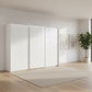 Rauch Heaven 300cm 3 Door Slider Wardrobe with Glass Doors and Lights in Alpine White styled in a modern bedroom