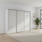 Rauch Heaven 300cm 3 Door Slider Wardrobe with Glass Doors in Silk Grey styled in a modern bedroom