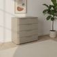 Rauch Heaven 3+2 Drawer Décor Chest in Fango styled in a modern room