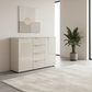 Rauch Heaven 4 Drawer 2 Door Chest with Glass Front in Champagne styled in a modern room