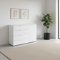 Rauch Heaven 4 Drawer 1 Door Décor Chest in Alpine White styled in a modern room
