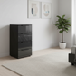 Rauch Heaven 40cm 4 Drawer Chest with Glass Top and Front in Black styled in a modern room