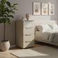 Rauch Heaven 40cm 4 Drawer Chest with Glass Top and Front in Fango styled in a modern room