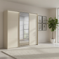 Rauch Heaven 240cm 3 Door Slider Wardrobe with 2 Décor Doors, 1 Mirror Door and Lights in Champagne styled in a modern bedroom