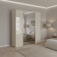 Rauch Heaven 200cm 4 Door Hinged Wardrobe with 2 Glass Doors and 2 Mirror Doors in Champagne styled in a modern bedroom