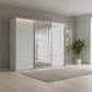 Rauch Heaven 300cm 3 Door Slider Wardrobe with 2 Glass Doors, 1 Mirror Door & Lights in Silk Grey styled in a modern bedroom
