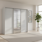 Rauch Heaven 240cm 3 Door Slider Wardrobe with 2 Décor Doors and 1 Mirror Door in Silk Grey styled in a modern bedroom