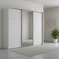 Rauch Heaven 270cm 3 Door Slider Wardrobe with 2 Glass Doors and 1 Mirror Door in Silk Grey styled in a modern bedroom