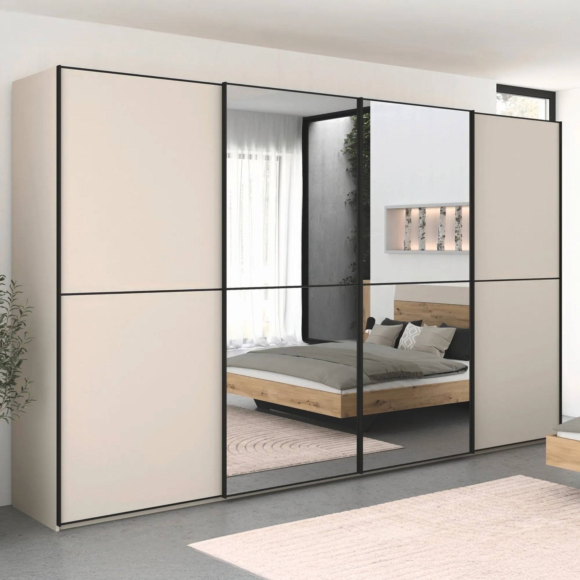 Supreme Duo Champagne 4 Door Sliding Wardrobe with Mirror with Black Trims and Door Handles Width size 320cm, 360cm and 400cm - Styled in a Living Room