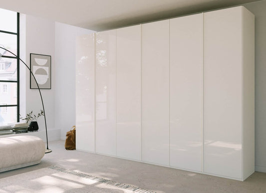 Symphony 301cm 6 Door Hinged Wardrobe in White Glass - Styled in a Bedroom