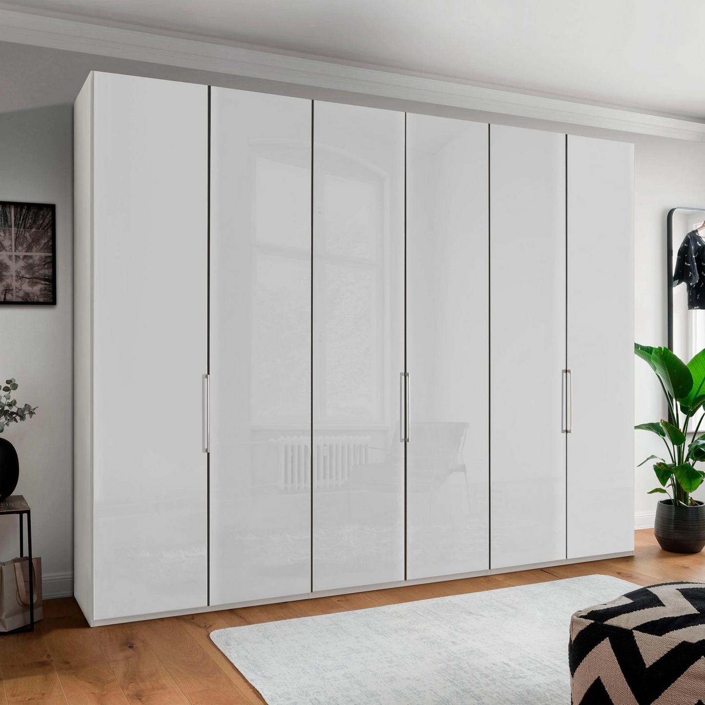 Templin 1000 6 Door Hinged Wardrobe in White Carcase & White Glass Front - Styled in a Bedroom