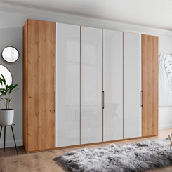 Templin 1000 Bianco Oak Carcase 6 Door Hinged Wardrobe in White Glass - 300cm - Styled in a Bedroom
