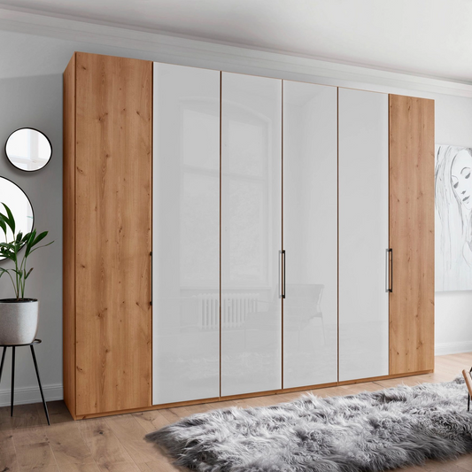 Templin 1000 Bianco Oak Carcase 6 Door Hinged Wardrobe in White Glass - 300cm - Styled in a Bedroom