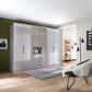 Templin 2000 Pebble Grey Glass 6 Door 3 Drawers 300cm Wardrobe With Mirror - Styled in a Living Room