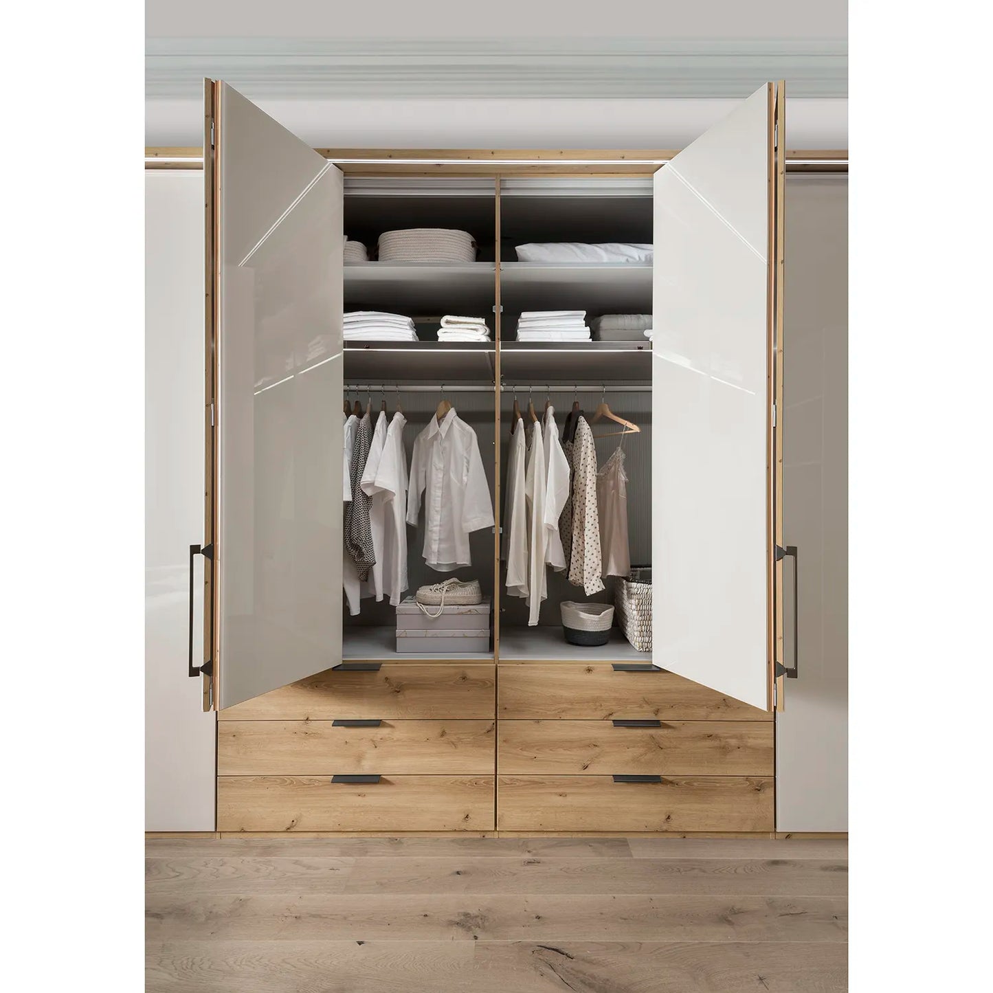 Templin 2000 Bianco Oak Carcase 6 Door 6 Drawer Wardrobe - W300cm - Bifold Interior View Styled in a Living Room