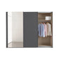 Modern wardrobe with sliding doors and clothes inside on a white background