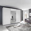 Tubona White 3 Door Sliding Wardrobe with Mirror – styled in a living room
