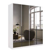 White wardrobe with grey mirror doors in a room with a window and decor elements.