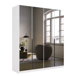 White wardrobe with grey mirror doors in a room with a window and decor elements.