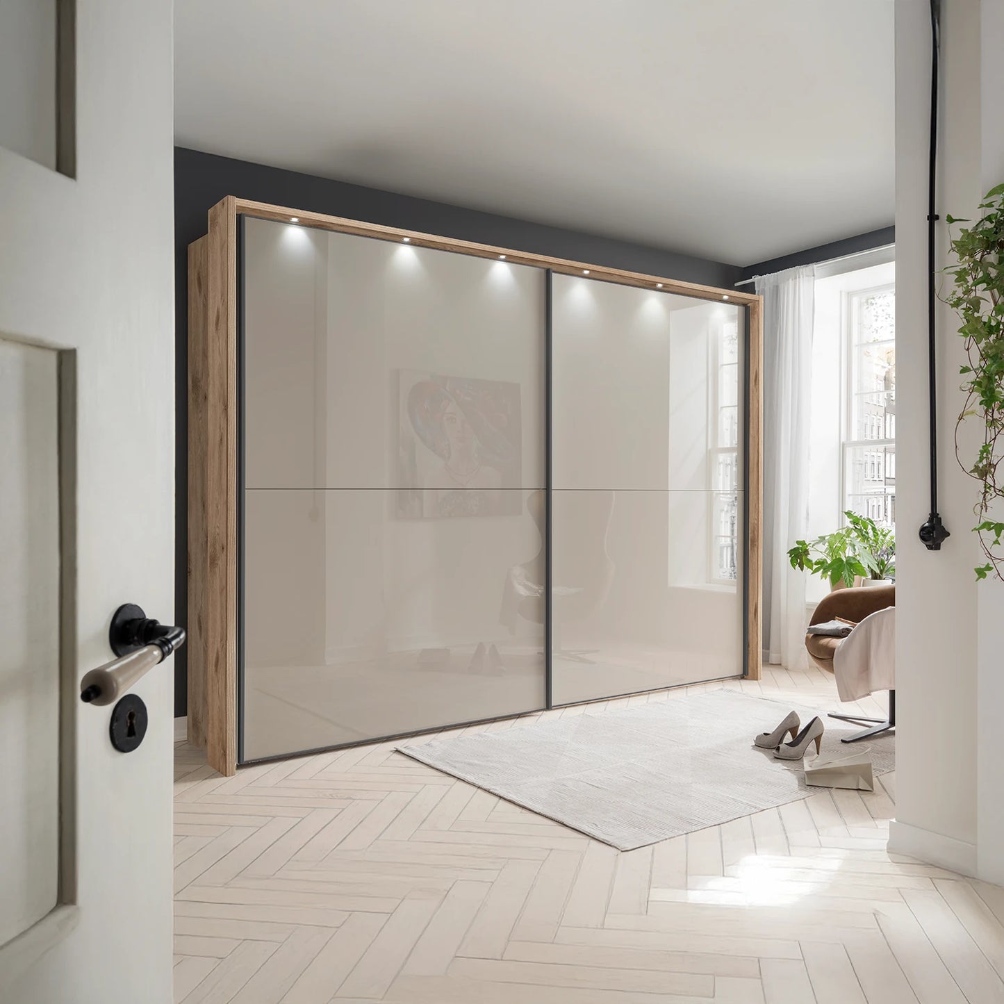 Wiemann Bristol Berlin Rustic Oak Carcase and Pebble Grey Glass Sliding Door Wardrobe with Lights in 160cm, 210cm, 260cm and 310cm widths.