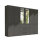 A modern dark gray wooden wardrobe with a mix of solid doors, two mirrored doors, and two drawers in the center, shown on a plain white background.