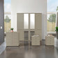 A modern Wiemann Cairns 4 Piece bedroom furniture set consisting of a four-door wardrobe with Mirror, a four-drawer chest, a pair of three-drawer bedside table in Pebble Grey colour