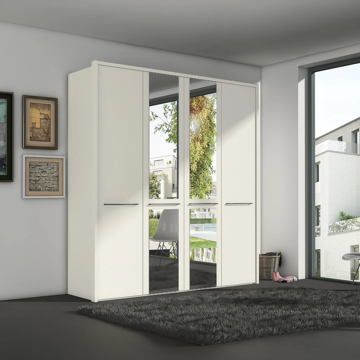 A modern white Wiemann Cairns wardrobe with two mirrored doors and two solid doors, set in a contemporary room with a dark gray rug and framed wall art.