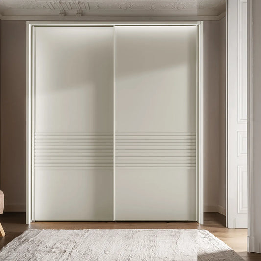 Front view of Wiemann Genova Kontrast white sliding wardrobe with sleek 2-door design.