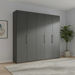 Wiemann Halver Graphite 5 Door Hinged wardrobe in a room with a plant and framed picture on the wall.