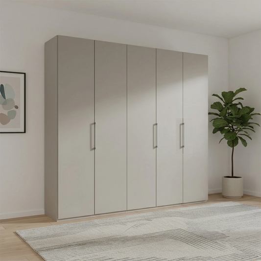 Large Wiemann Halver  wardrobe with five doors in a room with a plant and framed picture.