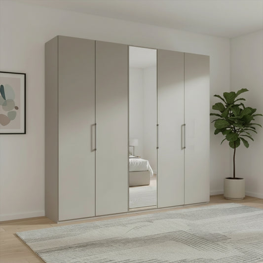 Large pebble grey wardrobe with five doors in a room with a plant and framed picture.