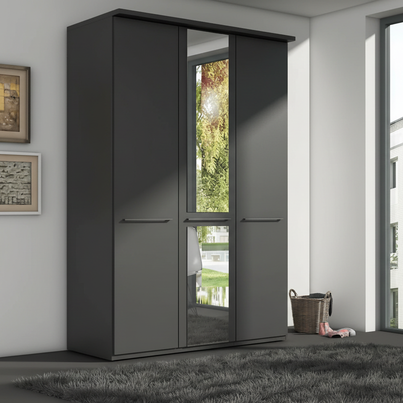 A tall Graphite three-door wardrobe with Middle mirrored door and two solid doors, shown in a modern room setting with a gray rug, basket, and framed wall art.
