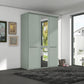 A modern 3-door Wiemann Cairns wardrobe with a mirrored door and two solid doors in Sage Green Colour