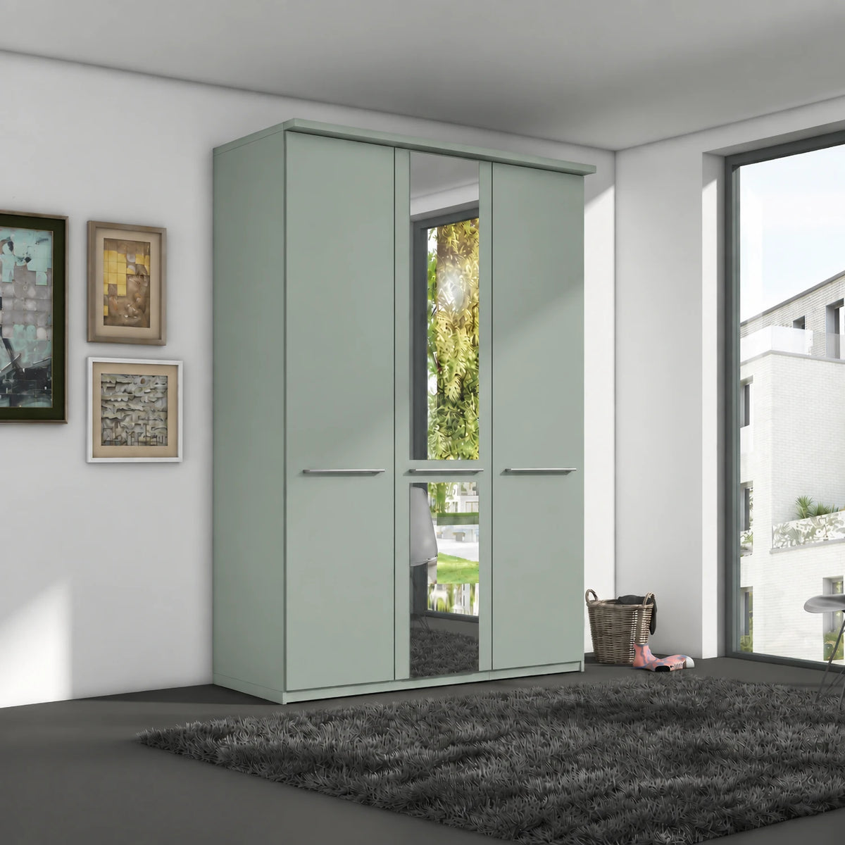 A modern 3-door Wiemann Cairns wardrobe with a mirrored door and two solid doors in Sage Green Colour