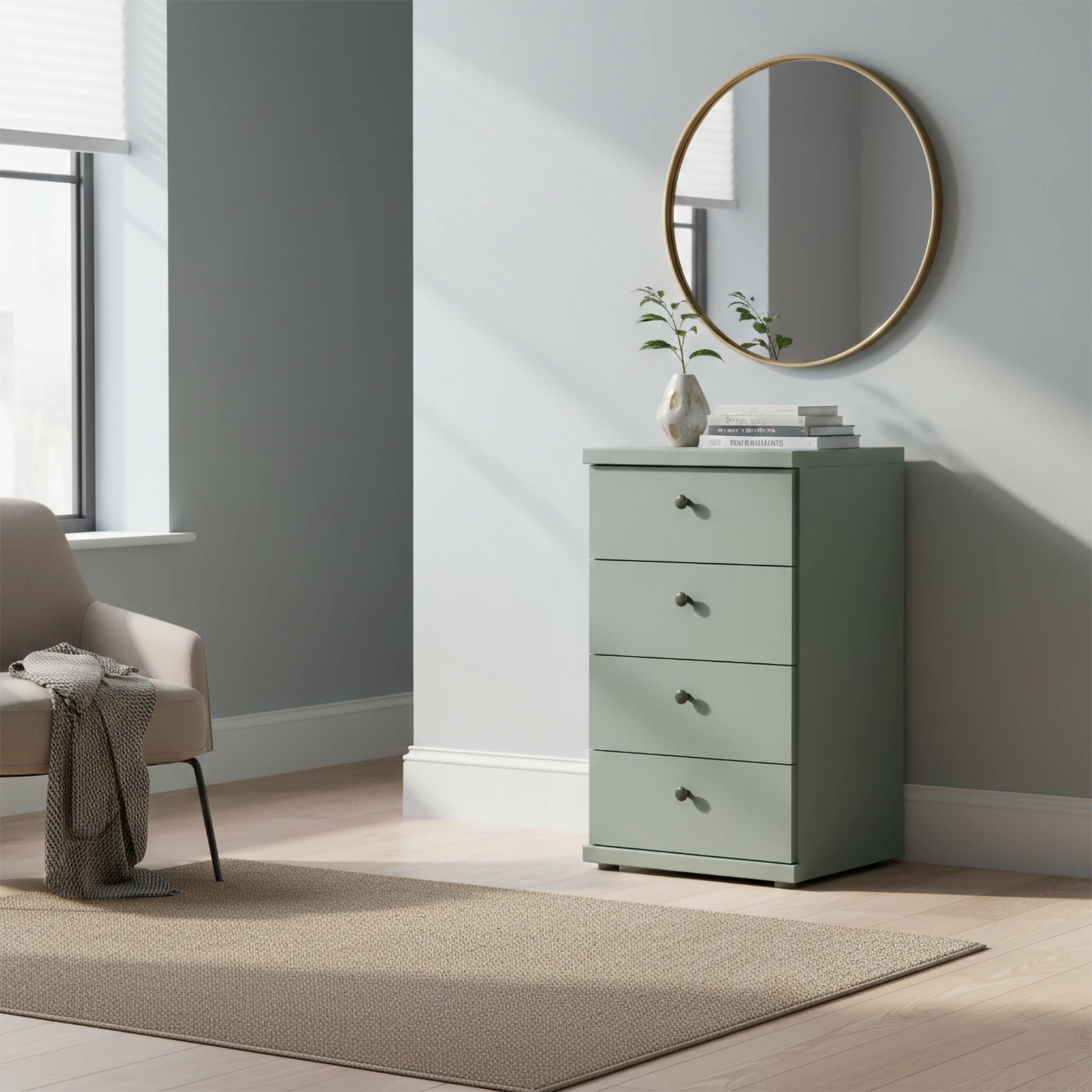 Light green chest of drawers with round mirror in a room with a chair and window.
