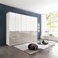 A large modern two colour tone Wiemann Santa 300cm 6 Doors & 4 Drawers Combi Wardrobe in White & Pebble Grey Glass Finish, Height 236cm