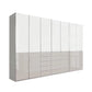 Modern Glamour Wiemann Santa 350cm Wide 216cm High,  7 Doors Wardrobe With Drawers, Chrome Handles and Strips  with glossy white upper doors and a lower section of five drawers, shown on a plain white background.