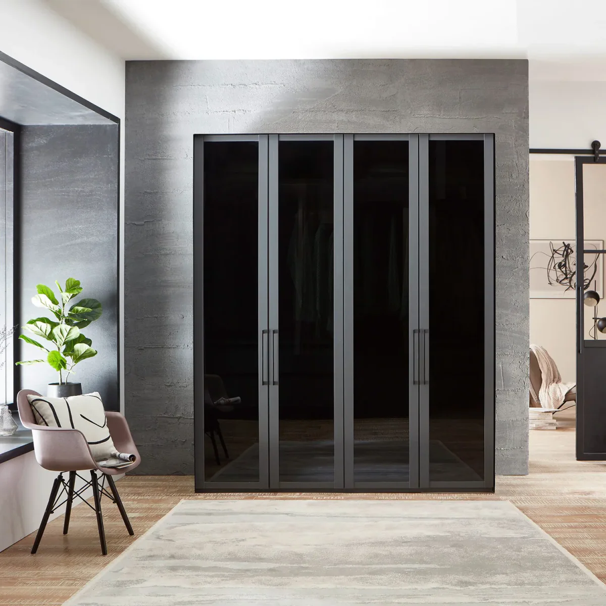 Lifetsyle Image of Wiemann Stylo Transparent Black Glass 4 Door Wardrobe Width 200cm Height 216cm or 236cm 