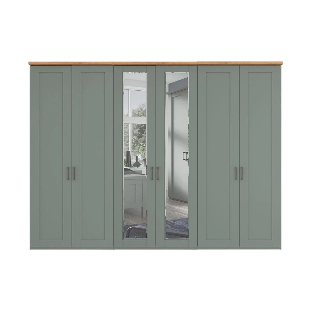 A large six-door wardrobe in a muted sage green colour with a natural light wood top and slate handles. Two of the doors have Mirror panels showing a reflection of a bedroom interior.