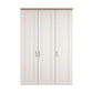 A three-door Wiemann Truro wardrobe or closet cabinet with paneled doors in an off-white finish, featuring a natural light wood top and slim silver handles, shown against a plain white background.