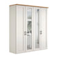 A four-door Wiemann Truro Shaker style wardrobe with paneled doors in a White, featuring a natural wood top cornice and Mirror Middle Doors