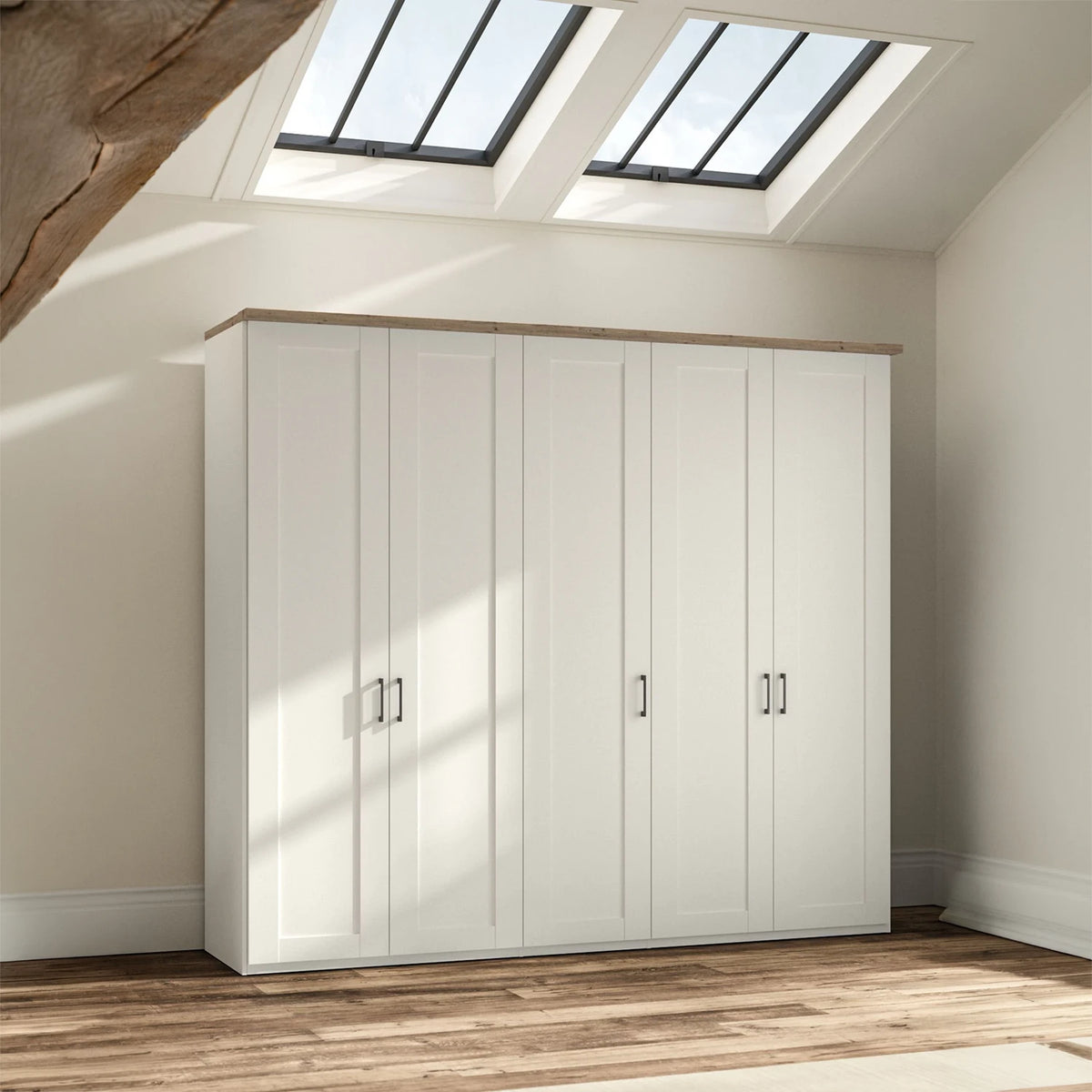 A five-door Wiemann Truro Shaker style wardrobe with paneled doors in a White, featuring a natural wood top cornice.